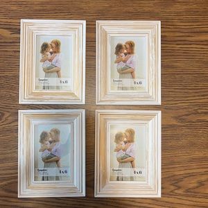 Set of 4- hanging or stand up 4x6 photo frames.